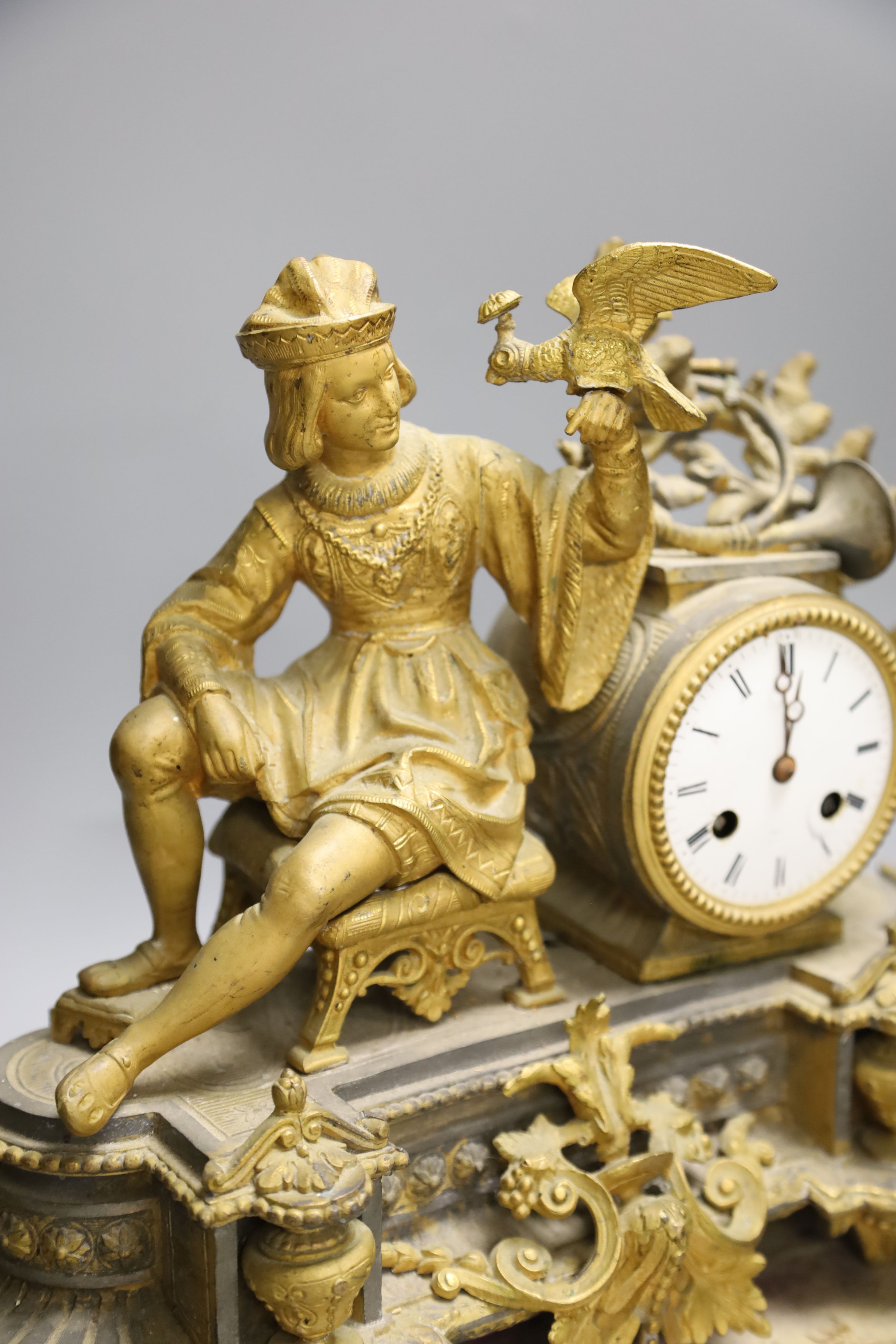 A French gilt metal figural mantel clock and base, overall height 34cm